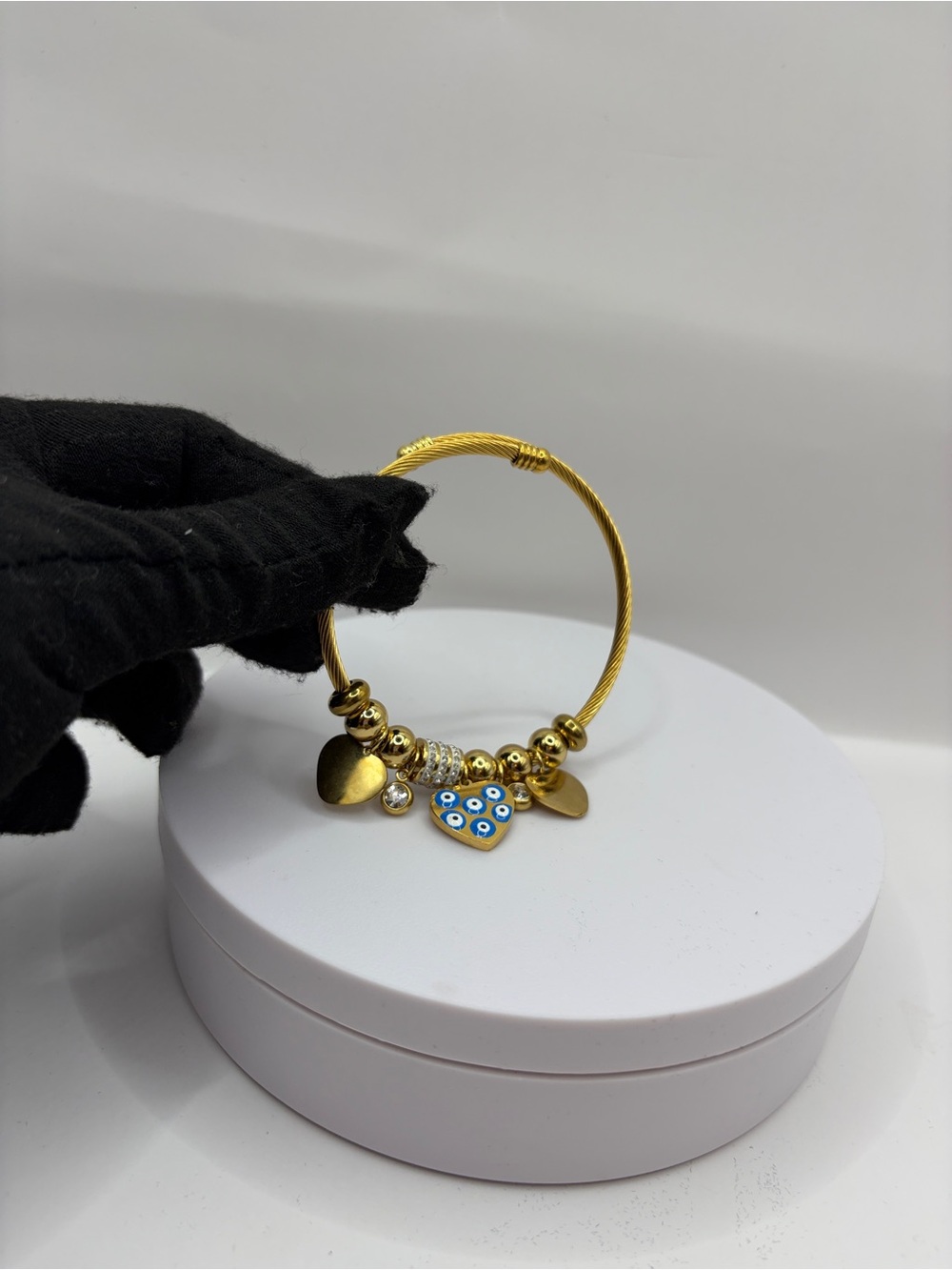 Stainless Steel Anti Tarnish Gold Heart Charm Bracelet with Blue Eye Accent